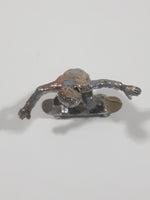 2011 NE-Rom Inc Miniature Silver Skateboarder 1 1/2" Tall Plastic Toy Figure