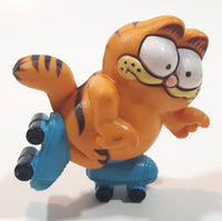 Vintage 1978 1981 United Features Syndicate Garfield Roller Skating 2 1/4" Tall PVC Toy Figure Made in Hong Kong