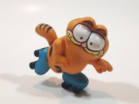 Vintage 1978 1981 United Features Syndicate Garfield Roller Skating 2 1/4" Tall PVC Toy Figure Made in Hong Kong