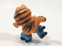 Vintage 1978 1981 United Features Syndicate Garfield Roller Skating 2 1/4" Tall PVC Toy Figure Made in Hong Kong