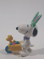 United Feature Peanuts Snoopy Easter Bunny Pushing Wheelbarrow Of Eggs with Woodstock 2 3/4" Tall PVC Toy Figure