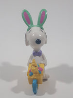 United Feature Peanuts Snoopy Easter Bunny Pushing Wheelbarrow Of Eggs with Woodstock 2 3/4" Tall PVC Toy Figure