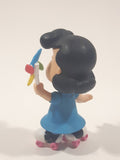 JP Just Play PNTS Peanuts Lucy Wearing Roller Skates Holding Rainbow Wind Pinwheel 3" Tall Vinyl Toy Figure