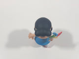 JP Just Play PNTS Peanuts Lucy Wearing Roller Skates Holding Rainbow Wind Pinwheel 3" Tall Vinyl Toy Figure