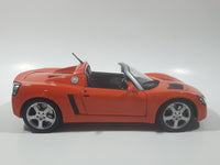 Maisto Opel Speedster Convertible Orange 1/18 Scale Die Cast Toy Car Vehicle with Opening Hood, Doors, and Trunk 8 1/4" Long