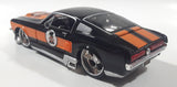 Maisto Harley Davidson Motor Cycles 1967 Ford Mustang GT Black and Orange 1/24 Scale Die Cast Toy Car Vehicle with Opening Hood, Trunk, and Doors