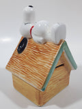 Peanuts Snoopy Laying On His Doghouse 5" Tall Ceramic Coin Bank