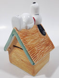 Peanuts Snoopy Laying On His Doghouse 5" Tall Ceramic Coin Bank