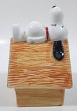 Peanuts Snoopy Laying On His Doghouse 5" Tall Ceramic Coin Bank