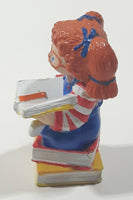 1984 OAA Panosh Place Cabbage Patch Kids Red Hair with Pigtails Sitting On Books Reading A Book 2 1/2" Tall PVC Toy Figure