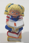 1984 OAA Panosh Place Cabbage Patch Kids Blonde Hair with Pigtails Sitting On Books Reading A Book 2 1/2" Tall PVC Toy Figure