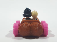 1993 McDonald's U.C.S. & Amblin The Flintstones Betty Rubble and Bamm Bamm in Log Car Plastic Toy Vehicle 1 3/4" Long