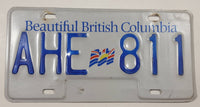 Beautiful British Columbia White with Blue Letters Vehicle License Plate AHE 811