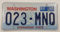2004 Washington "Evergreen State" in Red on White and Blue Mountain Backdrop with Blue Letters Vehicle License Plate 023 MNQ