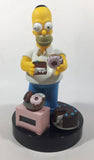 1998 Wesco The Simpsons Homer Simpson With Chocolate Cake and Donuts 9 1/2" Tall Talking Alarm Clock