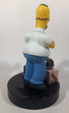 1998 Wesco The Simpsons Homer Simpson With Chocolate Cake and Donuts 9 1/2" Tall Talking Alarm Clock