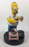 1998 Wesco The Simpsons Homer Simpson With Chocolate Cake and Donuts 9 1/2" Tall Talking Alarm Clock