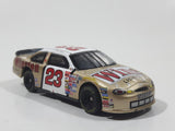 Action Racing Team Caliber Team Winston Limited Edition 1 of 10,080 NASCAR #23 Jimmy Spencer 1999 Ford Taurus No Bull Food City Gold and White Die Cast Race Car Vehicle