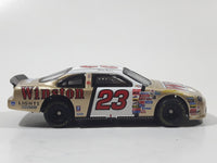 Action Racing Team Caliber Team Winston Limited Edition 1 of 10,080 NASCAR #23 Jimmy Spencer 1999 Ford Taurus No Bull Food City Gold and White Die Cast Race Car Vehicle