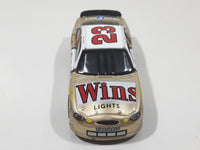 Action Racing Team Caliber Team Winston Limited Edition 1 of 10,080 NASCAR #23 Jimmy Spencer 1999 Ford Taurus No Bull Food City Gold and White Die Cast Race Car Vehicle