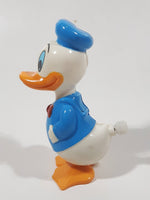 Tomy Walt Disney Productions Donald Duck Wobbling Shaking Wind Up Plastic Toy Figure