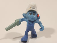 2011 Peyo "Carpenter" Smurf Holding a Saw with a Pencil in His Ear PVC Toy Figure McDonald's Happy Meal