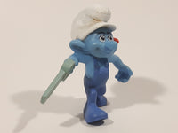 2011 Peyo "Carpenter" Smurf Holding a Saw with a Pencil in His Ear PVC Toy Figure McDonald's Happy Meal