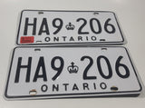 Matching Set of 2 Ontario White with Black Letters Vehicle License Plate HA9 206