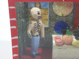 Mexican Folk Art Day of The Dead Skeleton Man and Woman Dining Room Food Table with Nude Poster On Wall 7 3/4" Wide Red Painted Diorama