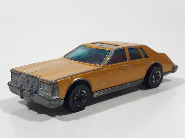 Vintage 1983 Hot Wheels Cadillac Seville Metalflake Gold Die Cast Toy Car Vehicle