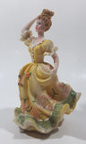 Lady in Yellow Dress with Pink Flowers 5 3/4" Tall Light Weight Resin Figurine