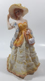 Victorian Woman in Yellow Dress and Hat with Scarf and Purse 8" Tall Resin Figurine Sculpture