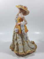 Victorian Woman in Yellow Dress and Hat with Scarf and Purse 8" Tall Resin Figurine Sculpture