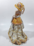 Victorian Woman in Yellow Dress and Hat with Scarf and Purse 8" Tall Resin Figurine Sculpture