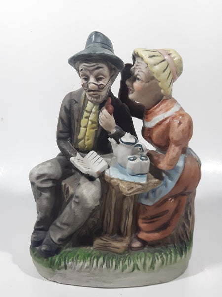 Vintage Old Man and Woman Couple Woman Whispering In His Ear Book and Teapot Set 7" Tall Figurine Sculpture