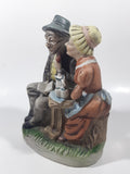 Vintage Old Man and Woman Couple Woman Whispering In His Ear Book and Teapot Set 7" Tall Figurine Sculpture