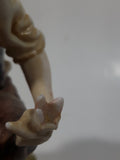 Vintage Man and Woman Sitting Holding Flowers 6 1/4" Tall Porcelain Figurine