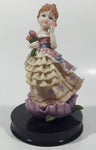 2002 Secret Treasures Girl Holding Flowers in Pretty Dress 8" Tall Resin Figurine on Wood Base