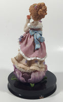 2002 Secret Treasures Girl Holding Flowers in Pretty Dress 8" Tall Resin Figurine on Wood Base