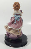 2002 Secret Treasures Girl Holding Flowers in Pretty Dress 8" Tall Resin Figurine on Wood Base