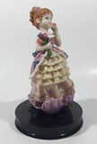 2002 Secret Treasures Girl Holding Flowers in Pretty Dress 8" Tall Resin Figurine on Wood Base