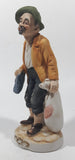 Vintage Hobo Man Holding Bags 7" Tall Porcelain Figurine Made in Japan