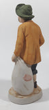 Vintage Hobo Man Holding Bags 7" Tall Porcelain Figurine Made in Japan