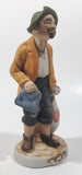 Vintage Hobo Man Holding Bags 7" Tall Porcelain Figurine Made in Japan