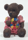 Dark Brown Teddy Bear Sitting In Pink Dress Holding Snake Formed As The Letter G 3 1/2" Tall Resin Figurine