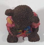 Dark Brown Teddy Bear Sitting In Pink Dress Holding Snake Formed As The Letter G 3 1/2" Tall Resin Figurine