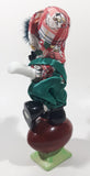 Porcelain Clown Balancing On Football 8" Tall Figurine