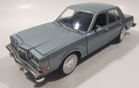 2011 Motor Max No. 73333 1986 Dodge Diplomat Metallic Light Blue 1/24 Scale 8 1/2" Long Die Cast Toy Car Vehicle with Opening Front Doors and Hood