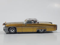 Disney Pixar Cars Cadillac Coupe de Ville Gold with Brown and White Cow Print Roof Die Cast Toy Car Vehicle