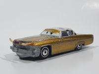 Disney Pixar Cars Cadillac Coupe de Ville Gold with Brown and White Cow Print Roof Die Cast Toy Car Vehicle